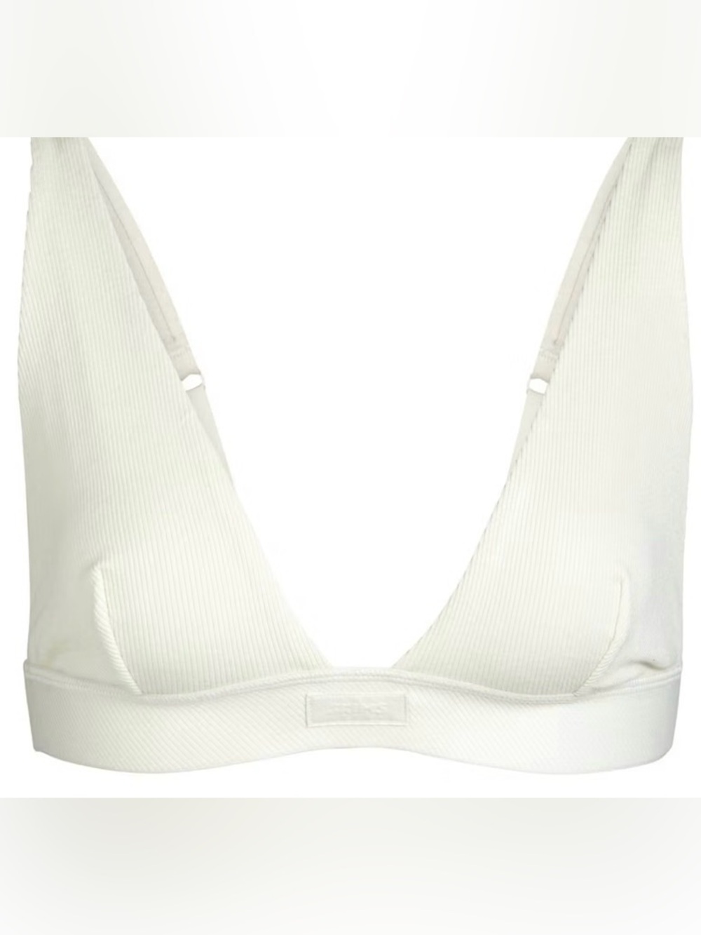 Soft and comfy SKIMS Cotton Rib Plunge Bralette in the classic Bone cream/ivory